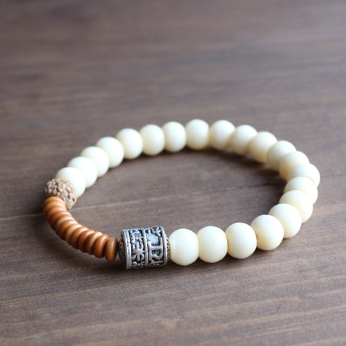 Tibetan Buddhism Totem Charm & Tagua Nut